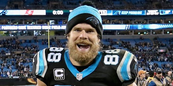 CHARLOTTE, NC - JANUARY 03: Greg Olsen #88 of the Carolina Panthers celebrates as he runs off the field after their game against the Tampa Bay Buccaneers at Bank of America Stadium on January 3, 2016 in Charlotte, North Carolina. (Photo by Streeter Lecka/Getty Images)